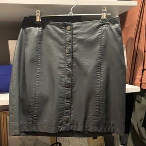 Free people faux leather skirt with buttons down the middle. Tags on! Never worn